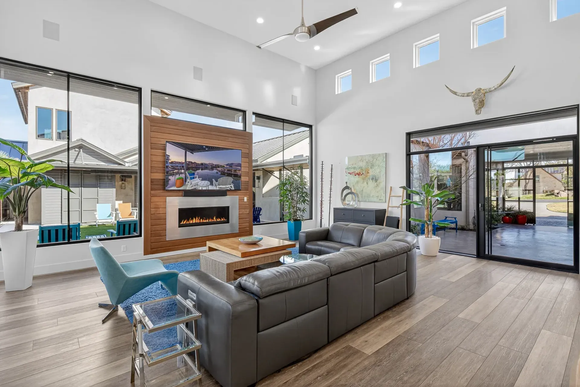 Living room with clerestory windows and courtyard access